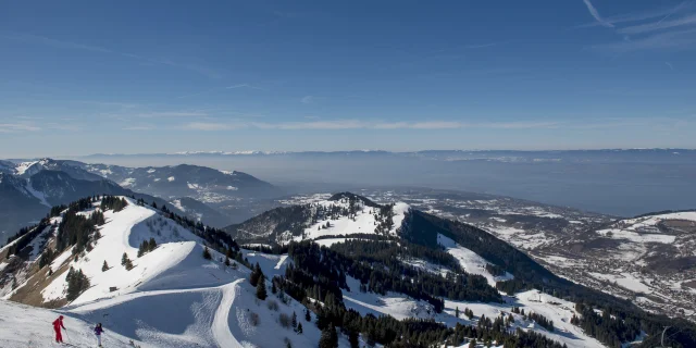 Snow-covered Bernex mountains overlooking Lake Geneva