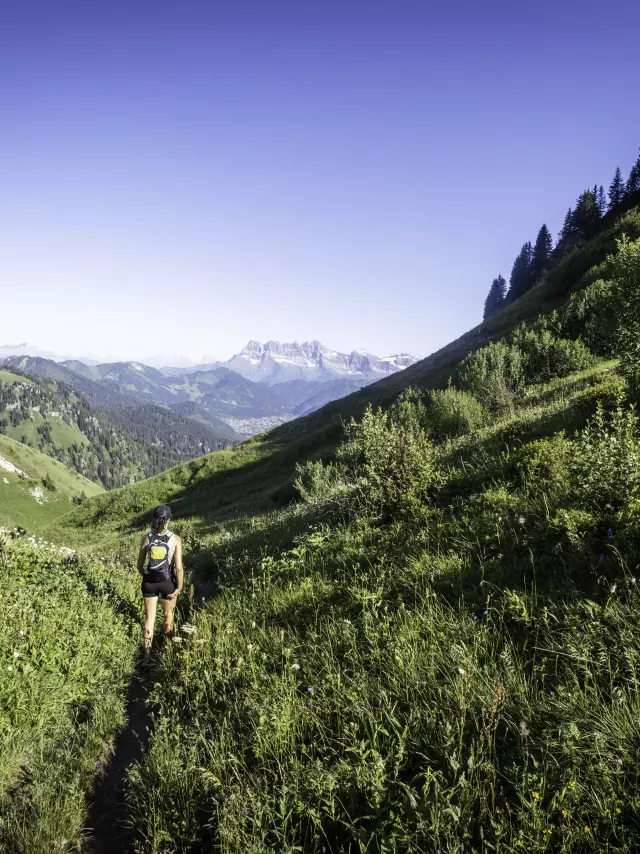 a hiker among the mountains